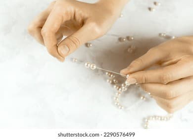 Beginner creating pearl jewelry